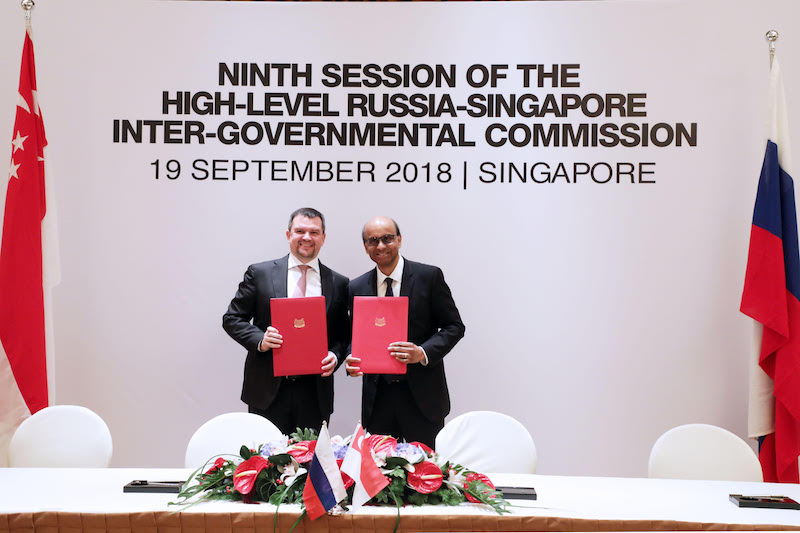 DPM Tharman Shanmugaratnam and DPM Maxim Akimov with the signed Joint Statement of the Ninth Session of the IGC in Singapore, 19 September 2018.   [Photo credit: MFA Singapore]