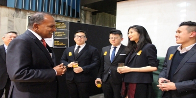 Minister Shanmugam interacting with Singapore students from Victoria University in Wellington, at the reception hosted by New Zealand Minister of Foreign Affairs Murray McCully [Photo: MFA]